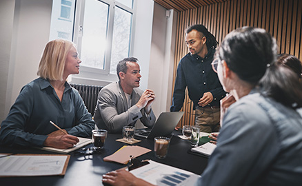 Two workers asking represents from their tender questions